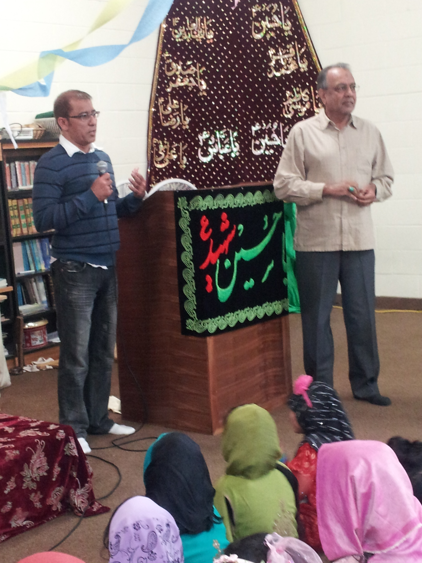 Students listening to speakers during the academy gathering