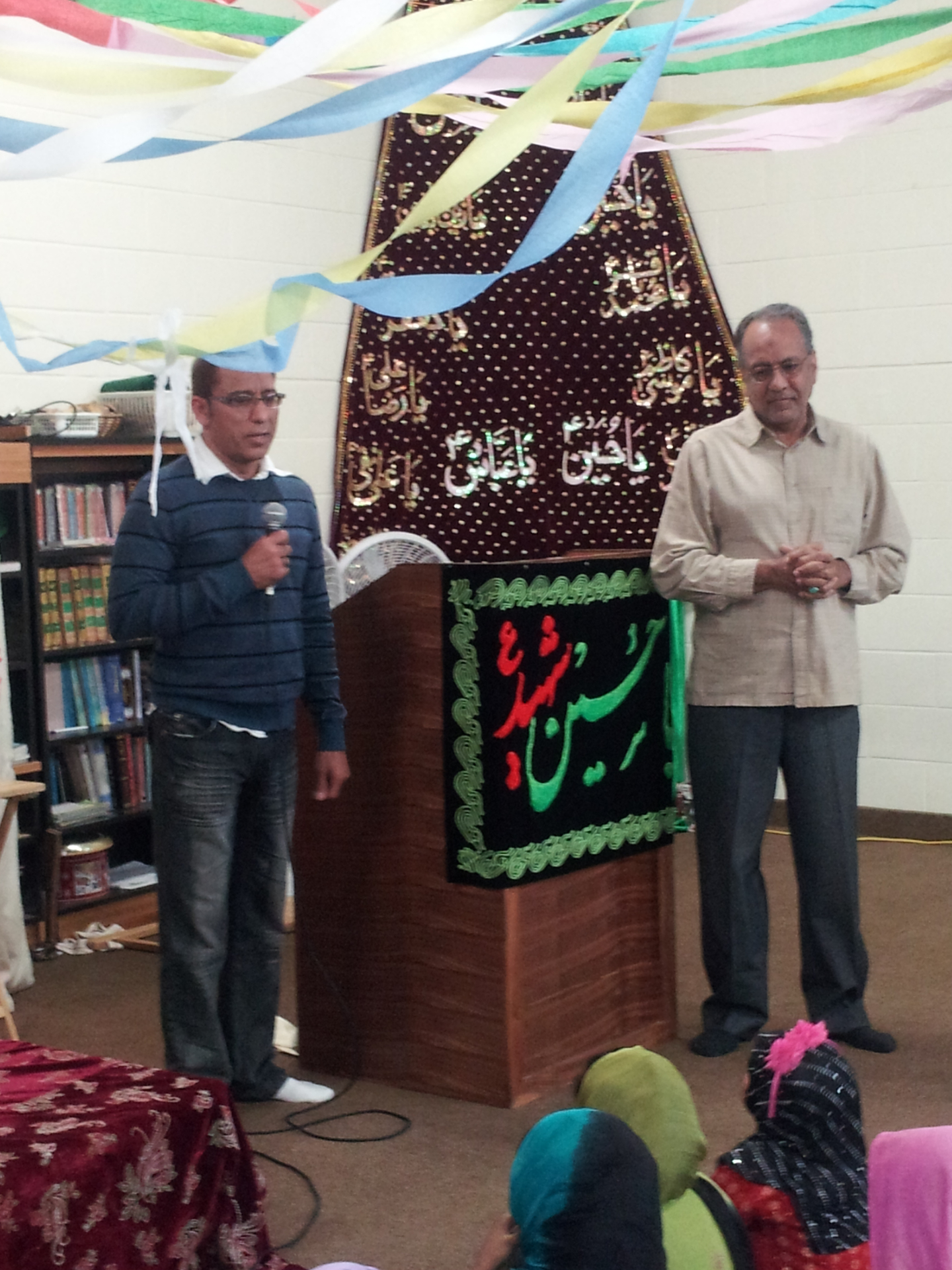 Guest speakers addressing students at the academy gathering