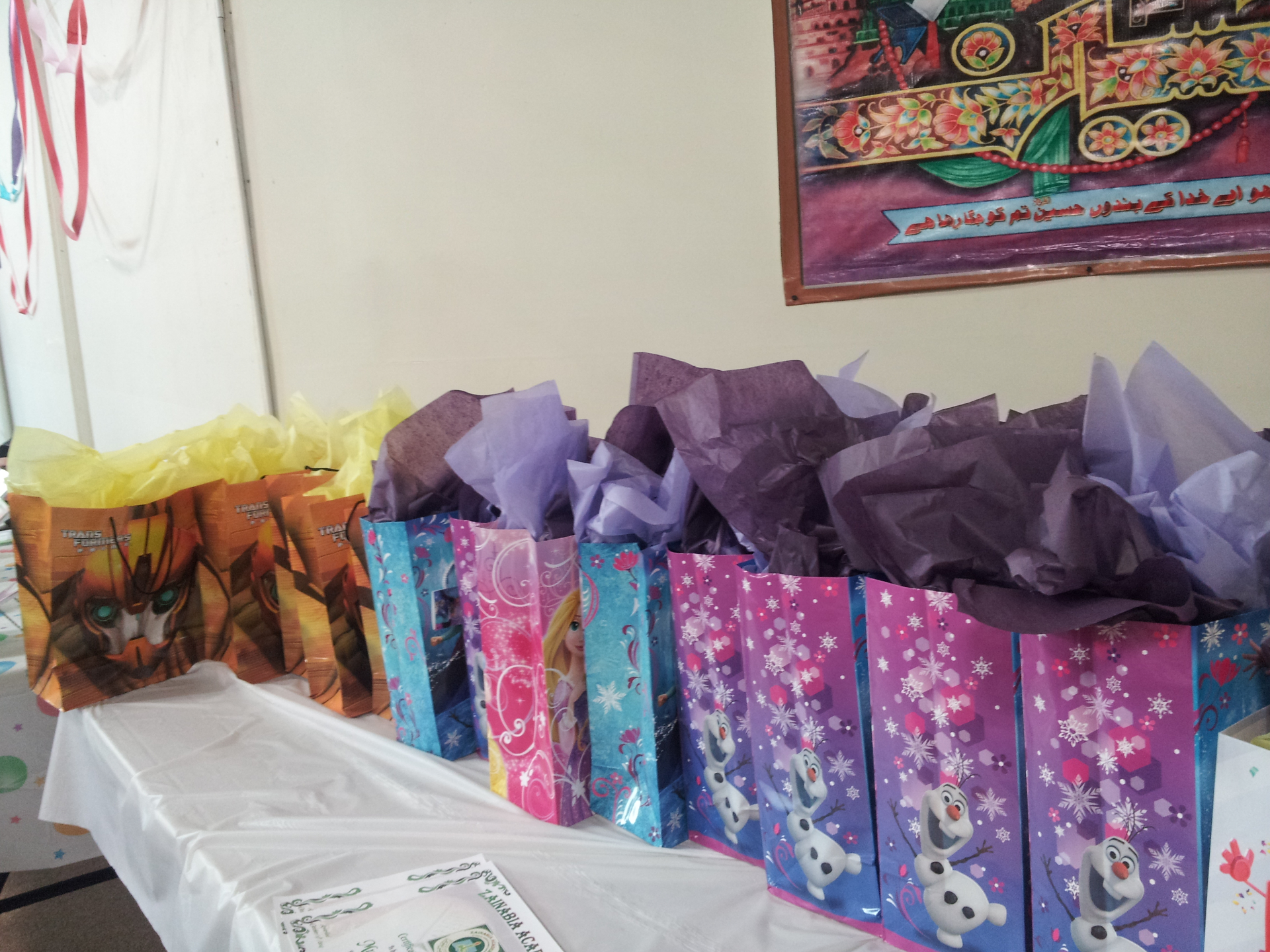 Colourful gift bags arranged for academy students